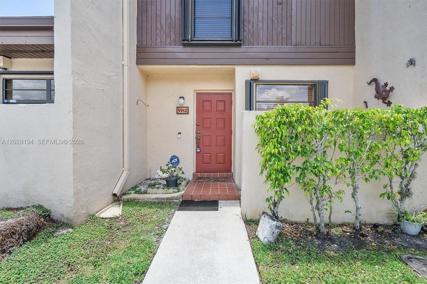 All ages welcome! Welcome to the perfect, budget-friendly starter home for a small family, located right in the heart of Pembroke Pines. Finding a completely turnkey, move-in-ready 2-bedroom, 2.5-bathroom townhouse under $300k in this area is a rare find, offering an incredible opportunity to own for less than the cost of renting!

The bright, tiled main floor features a spacious living area with a modern ceiling fan and large sliding glass doors opening to a private patio oasis. The functional layout seamlessly connects the dining room to a lovely kitchen equipped with light wood cabinetry, granite countertops, a stainless steel range, and an in-unit stacked washer/dryer. A main-floor half-bath adds great convenience for guests.

Upstairs, both bedrooms serve as peaceful retreats with warm wood-look laminate flooring and private en-suite setups. The primary bathroom features a stunning, upgraded glass-enclosed walk-in shower with modern blue-grey tile.

Complete with assigned parking right at your front door, this beautiful home is ready for you to pack your bags and move right in. Schedule your private tour today before this affordable gem is gone!