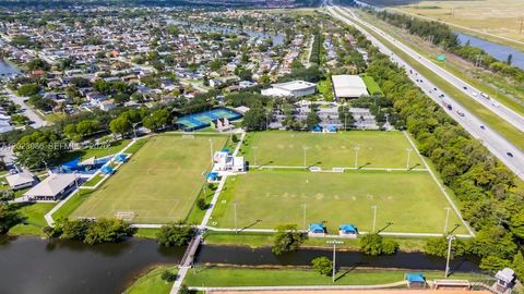 Tiny photo for 11641 NW 42nd St, Sunrise, FL 33323 (MLS # A12023086)