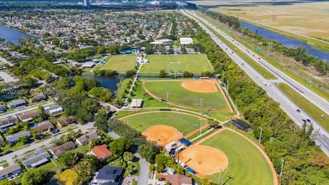 Tiny photo for 11641 NW 42nd St, Sunrise, FL 33323 (MLS # A12023086)
