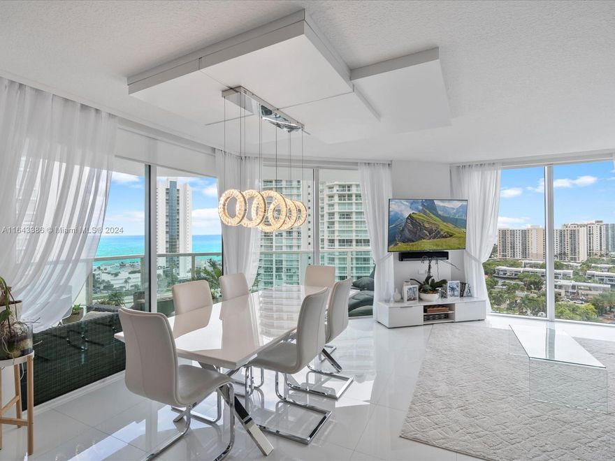 Come home to luxury of the best views in St. Tropez. This fully furnished condo has wrap around views of Sunny Isles and the ocean. From the comfort of your couch enjoy watching the boats go by or the firework shows on the beach. The condo is turnkey ready and features new appliances, upgraded washer and dryer and so much more! The open floor layout allows you to enjoy conversations with friends and family while cooking up a delicious meal. Huge wraparound balcony can be used as extra entertainment area for your guests. The beach is walking distance, but the building also has a courtesy van that will take you to and from. Each unit can get 2 chaises, umbrella and beach towels. Less than a block away is places of worship. Building features pool, gym and sauna