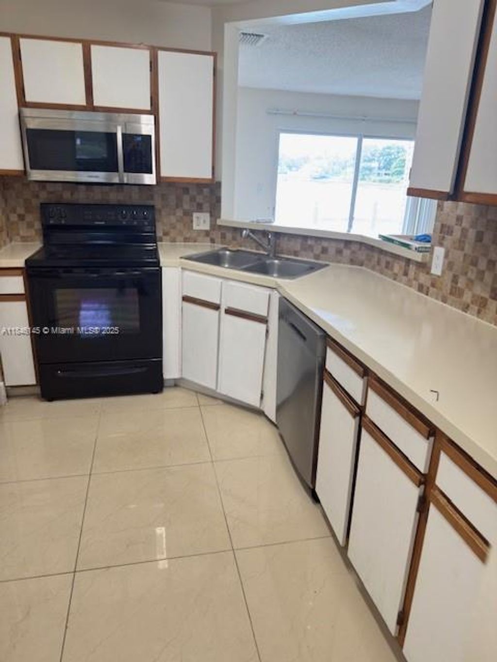 Photo of 3425 NW 44th St #103, Oakland Park, FL 33309 (MLS # A11846145)