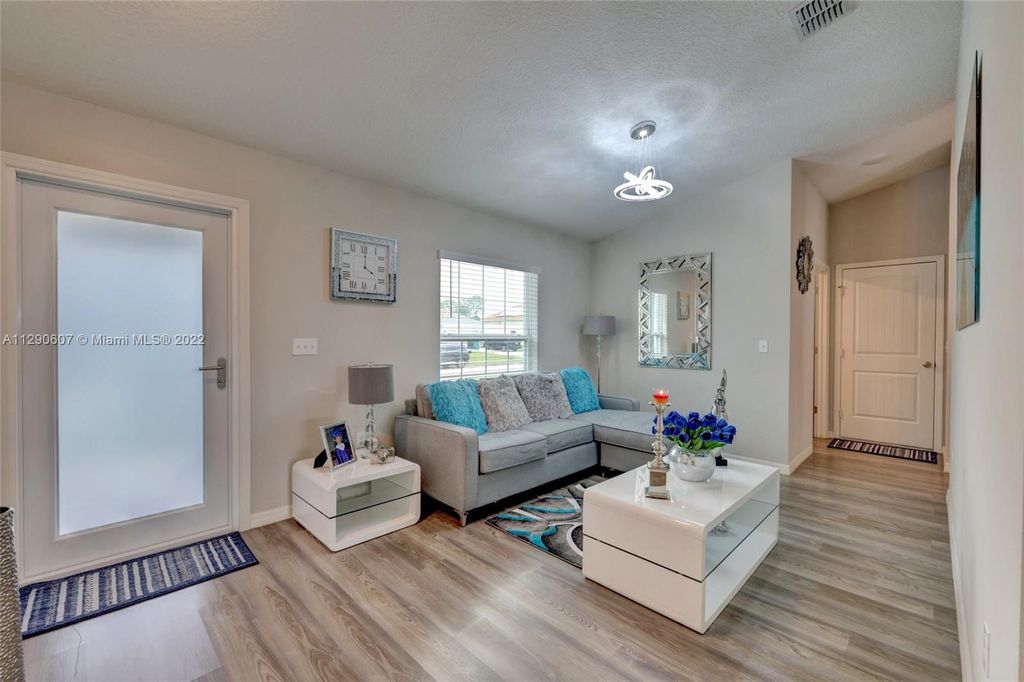 Photo of 1245 SW Bargello Ave, Port Saint Lucie, FL 34953 (MLS # A11290607)