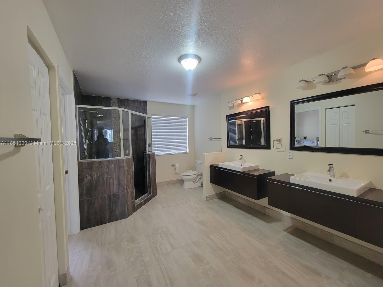 For Rent – this beautifully remodeled 4-bedroom, 3-bathroom coach-style home in the gated Doral Isles St. Tropez community is now available. The first floor includes one bedroom and one full bath, ideal for in-law or guest use. The home offers modern finishes, open layout, and abundant natural light. Residents enjoy resort-style amenities, including a clubhouse, multiple pools, a fitness center, tennis and basketball courts, scenic jogging/bike trails, landscaped lakes, a fishing pier, and waterfall features, as well as 24-hour security and concierge service. Conveniently located near top schools, shopping, dining, and major highways.
