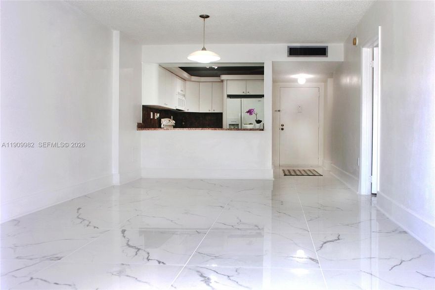 PRICE DROP!   UPDATED New Porcelain Tile Floors (32"x32") as of May 2026. .  Exceptional Price for this Beautiful &  Updated  Condo.  Spacious 1st Floor Unit offers plenty of  Natural Light. This Unit is Ideal for Primary Residence or Vacation Home.  Perfect for Home Buyer or for an Investor. 
All Ages Allowed.   Rentals Allowed.   Building Exterior &  Interior freshly painted in 2025.   
Prime location near FIU,  Aventura Mall, Aventura Hospital, and  the  Beach. 
Modern Kitchen  Cabinetry. 
The  Bedroom offers comfortable accommodations and bath  has been updated.
Plenty of Storage Space includes the Bdrm Walk-In Closet,  Xtra Closet,  Linen Closet and Hallway Utility Closet.     

Passed 40 Years Inspection.  Maintenance Includes Reserves. No Assessments due.