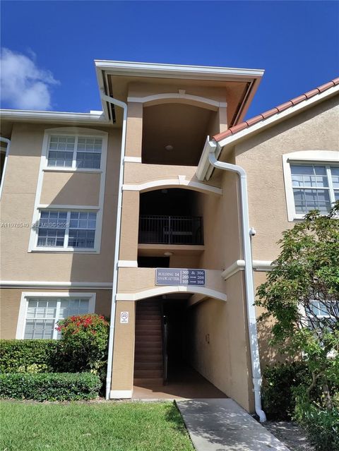 Photo of 215 SW 117th Ter #14205, Pembroke Pines, FL 33025 (MLS # A11978540)