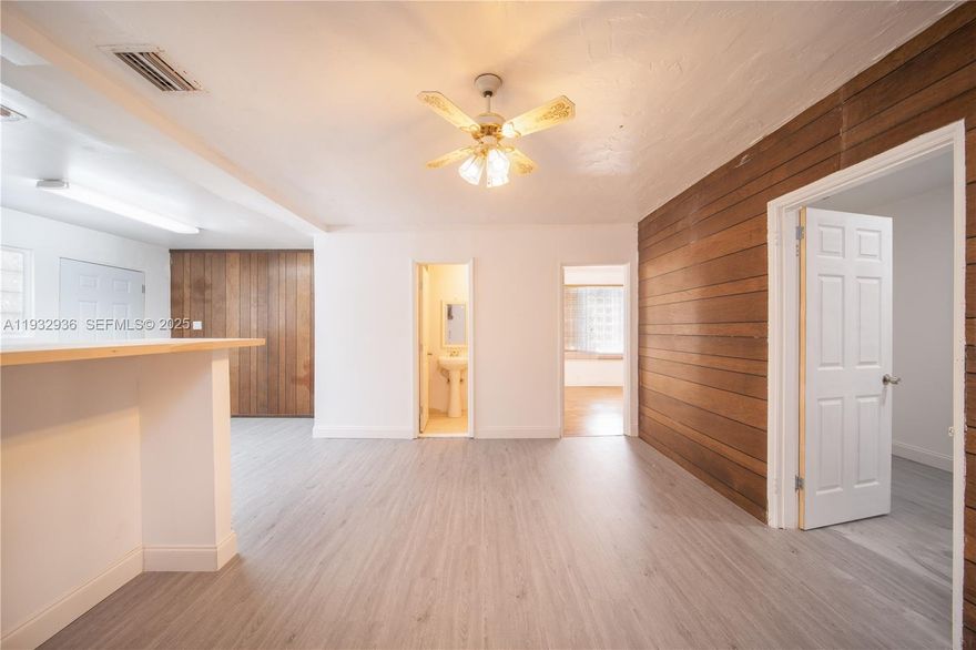 Charming 2 bedroom, 1 bathroom home/quadplex located in the heart of Little Gables. Property offers a cozy and comfortable living space, ample backyard, two covered parking spots and lots of street parking available. Also features large windows, an open layout, stainless steel appliances & custom cabinetry. Both bedrooms are generously sized and offer plenty of closet space. The shared bathroom is updated with modern fixtures and sleek design.