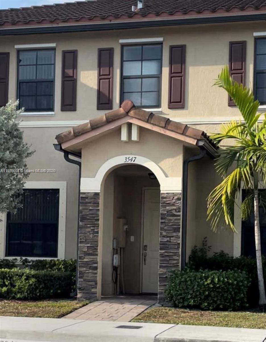 Beautiful 2/2.5 centrally located townhouse in Bellagio Villas. The first floor features sleek tile flooring and an open-concept kitchen with wood cabinets and stainless steel appliances. Upstairs, cozy carpet spans both bedrooms, each with its own spacious walk-in closet and en-suite bathroom. The laundry area is conveniently located on the second floor. The patio has been updated with pavers, perfect for outdoor dining or entertaining. Conveniently located just minutes from i75, 826, Miami International Airport, and local shops.