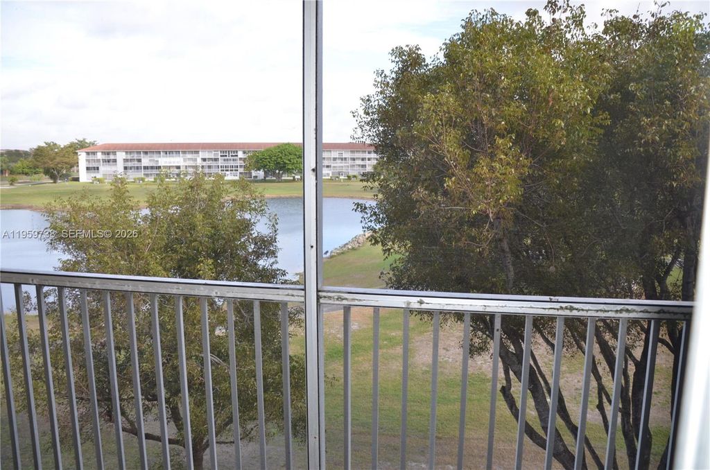 Photo of 13475 SW 9th St #407-A, Pembroke Pines, FL 33027 (MLS # A11959738)