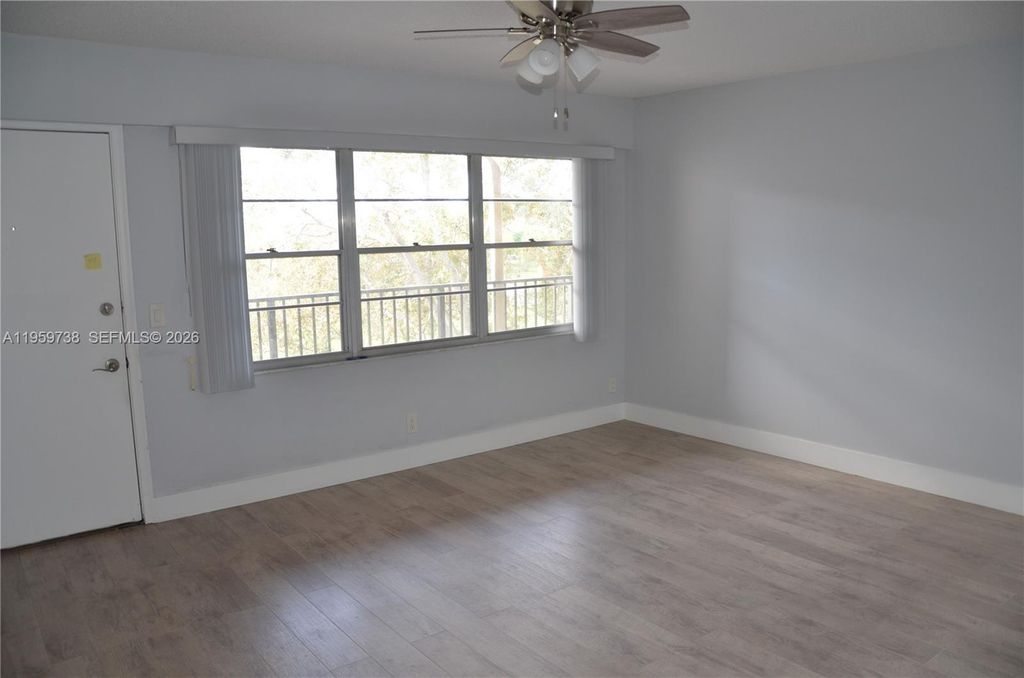 Photo of 13475 SW 9th St #407-A, Pembroke Pines, FL 33027 (MLS # A11959738)