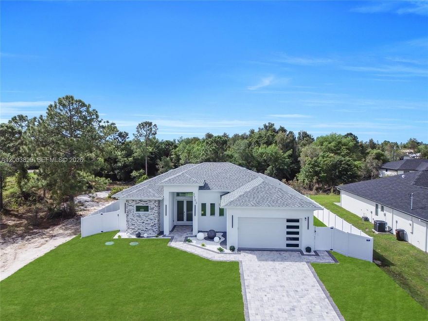 Stunning NEW CONSTRUCTION home with a PRIVATE POOL and FULLY FENCED PVC BACKYARD, offering the perfect blend of privacy and Florida outdoor living. This beautiful residence features 3 BEDROOMS + DEN and 2.5 BATHROOMS, with stylish modern finishes throughout.
Enjoy an impressive outdoor area complete with a RESORT-STYLE SHOWER and OUTDOOR KITCHENETTE, ideal for entertaining guests or relaxing by the pool. Inside, the OPEN FLOOR PLAN is enhanced by IMPACT WINDOWS, abundant natural light, and a designer kitchen featuring modern cabinetry and STAINLESS STEEL APPLIANCES.

The spacious PRIMARY SUITE offers a peaceful retreat with a WALK-IN CLOSET and a luxurious bathroom with elegant finishes. Additional highlights include a PAVER DRIVEWAY, SPRINKLER SYSTEM, and MINIMAL-MAINTENANCE LANDSCAPING.