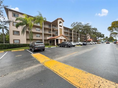 Photo of 1000 SW 125th Ave #102N, Pembroke Pines, FL 33027 (MLS # A11990550)