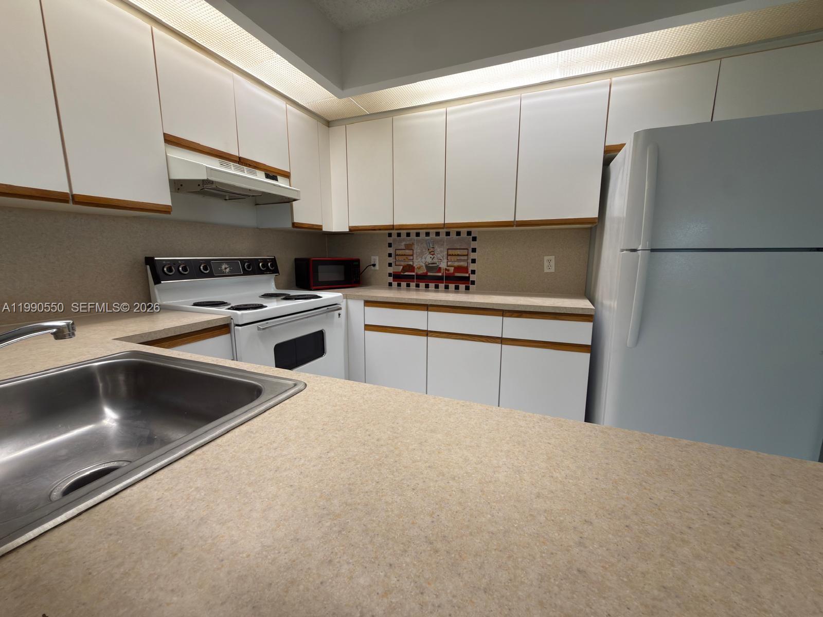 CAMBRIDGE AT CENTURY VILL - Residential