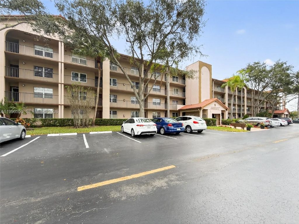 Photo of 1000 SW 125th Ave #102N, Pembroke Pines, FL 33027 (MLS # A11990550)