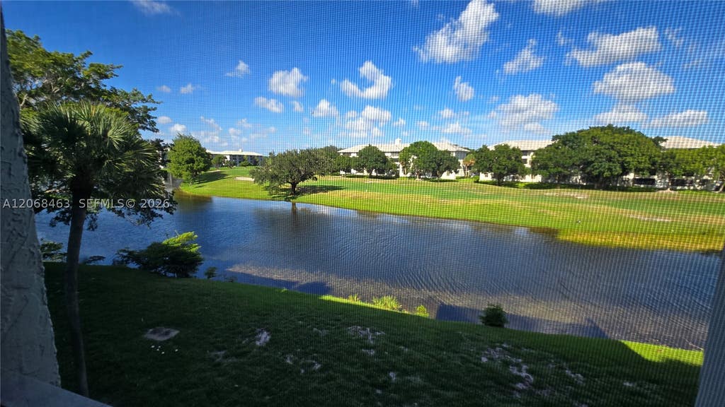 Photo of 9230 Lagoon Pl #310, Davie, FL 33324 (MLS # A12068463)