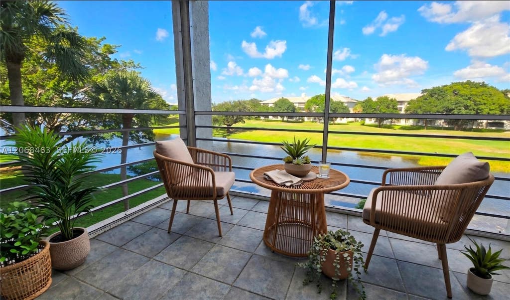 Photo of 9230 Lagoon Pl #310, Davie, FL 33324 (MLS # A12068463)