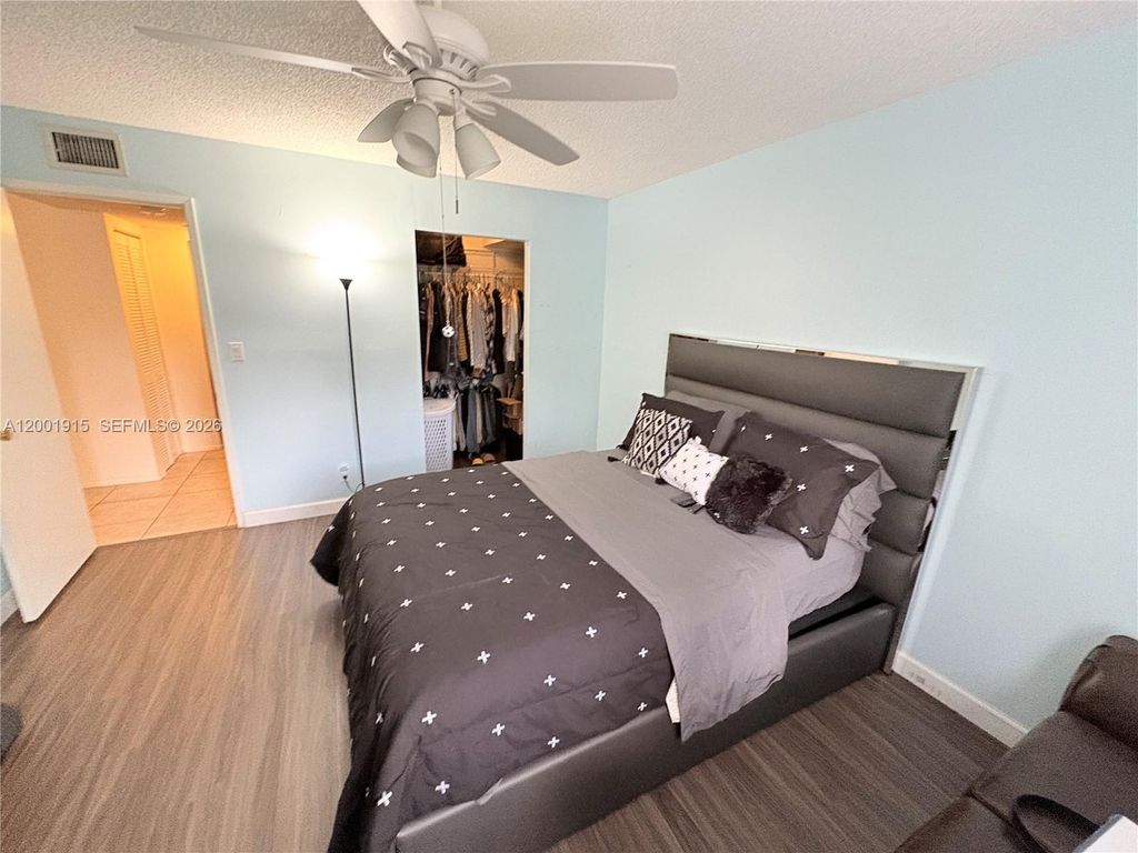 Photo of 2769 S Oakland Forest Dr #101, Oakland Park, FL 33309 (MLS # A12001915)