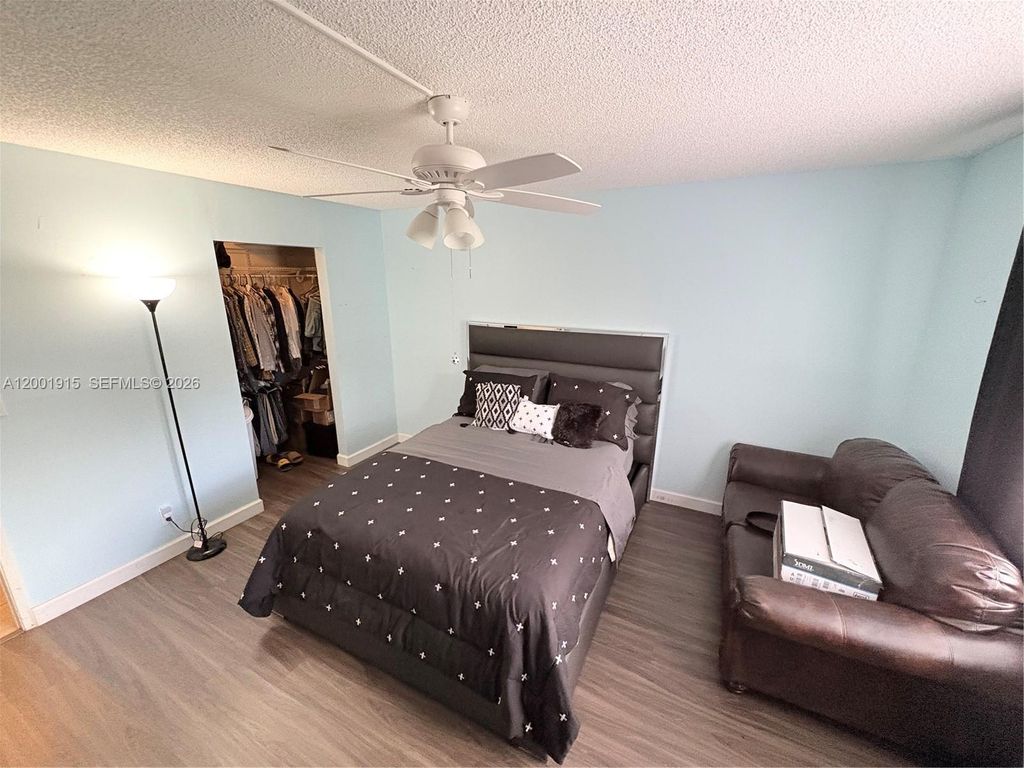 Photo of 2769 S Oakland Forest Dr #101, Oakland Park, FL 33309 (MLS # A12001915)