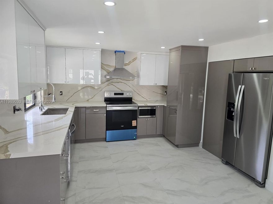 Completely renovated 3-bedroom, 2-bathroom single-family residence located in a quiet, well-established neighborhood. This property has been thoughtfully updated with high-quality finishes and modern design elements throughout.

Interior features include a fully upgraded kitchen with brand-new, premium appliances, contemporary cabinetry, and modern lighting. Major system improvements include a new Rheem HVAC system, updated plumbing and electrical systems, and a new washer and dryer.

Additional upgrades include hurricane-impact, energy-efficient windows and a newly installed sprinkler system. Future enhancement includes planned installation of a privacy fence.

Contact me today to schedule a private showing—this exceptional home will not last.