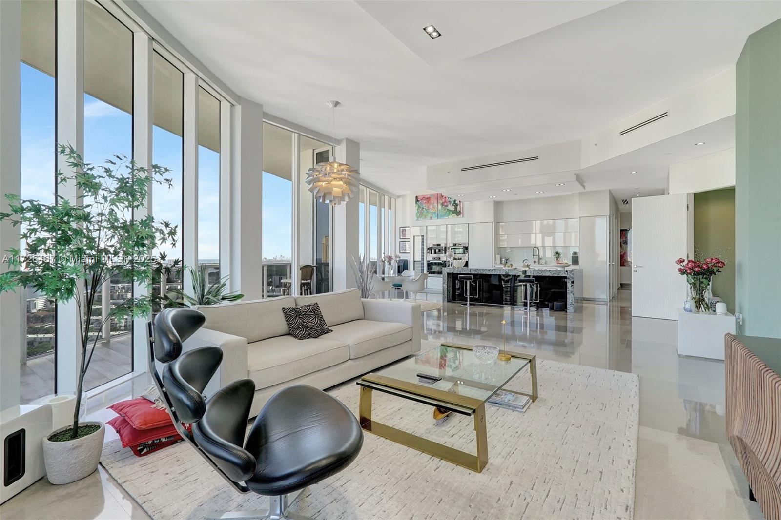 Stunning apartment in prestigious Bellini Williams Island, featuring 12-foot ceilings, custom soffit work w/LED lighting, & luxurious finishes. Missoni Wallpaper in All bedrooms & baths. The kitchen boasts imported Italian Poggenpohl cabinetry, Labradorite Bianca countertops, & Miele appliances including full size wine cooler. The master bath is fully renovated with Black Forest marble, Toto washlet system. Enjoy automated Savant systems, soundproof doors, & full-length impact glass windows. Includes two private parking spaces & large storage. Move-in ready with premium upgrades throughout. Live in prestigious Williams Island with full amenities: 15 tennis courts, 4 pickleball courts, 3 restaurants, state of the art spa, marina, walk/jog path, kids playground, courtesy bus, so much more...
