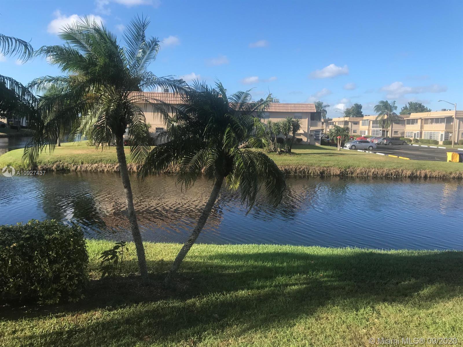 Beautiful unit on 2nd floor! (1 bed/1.5 bath) located on dead end street with view of wide canal from dining room, bedroom and balcony. Hardwood floors on all rooms; tile on bathrooms and kitchen. Brand new AC. Newly painted. Brand new lift. This resort community has 3 clubhouses on 2 Golf courses. On site cafe and bistro, exercise room, library, arts, crafts and ceramics room. Theater with live entertainment weekly. Courtesy bus to shopping daily. 15 min drive from the Ocean historic downtown of Delray Beach. 55+ community - Youngest must be 18 yrs or order. Private entrance thru Linton Rd for Saxony residents with barcode.