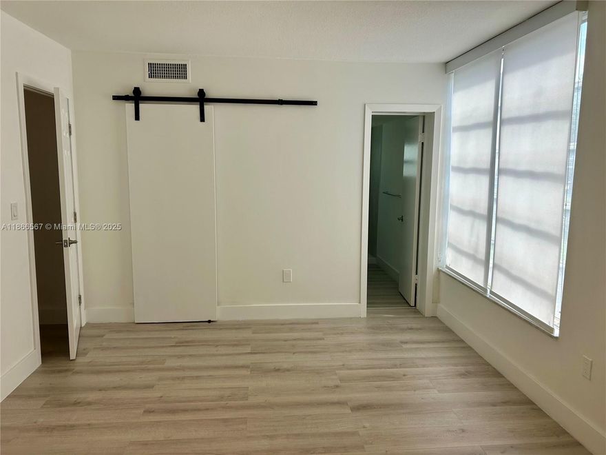 Remodeled corner unit with lots of light at Bay Harbor Islands, with large Master bathroom with walk-in-closet, office/second bedroom and visitors bath. Located at ground level for easy access. This gated building offers a big pool, storage and one assigned parking. One block from the great Ruth K Broad "A" school, and walking distance from Kane Concourse and Bal Harbour Shops, places of worship and the beach!