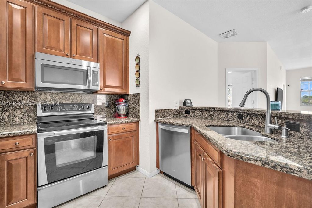 Photo of 9075 Preston Pl #9075, Tamarac, FL 33321 (MLS # A11994834)