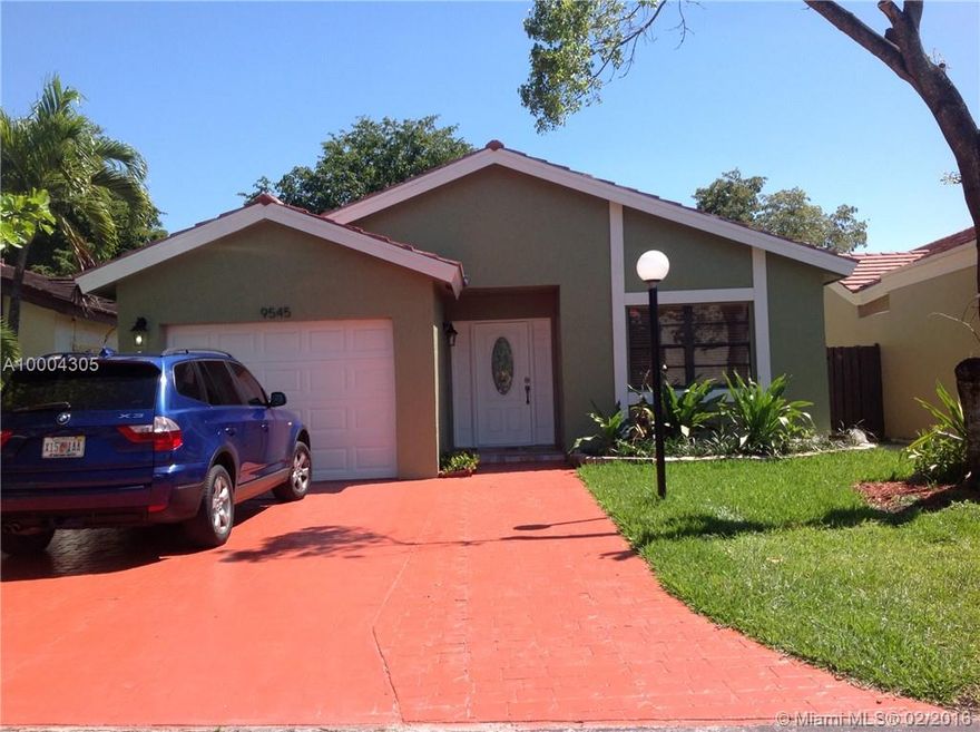 BEAUTIFUL HOME NEWLY REMODELED 3/2, NEW TILE FLOORS THROUGH OUT, NEW ROOF AND NEW HIGH EFFICIENCY A/C.