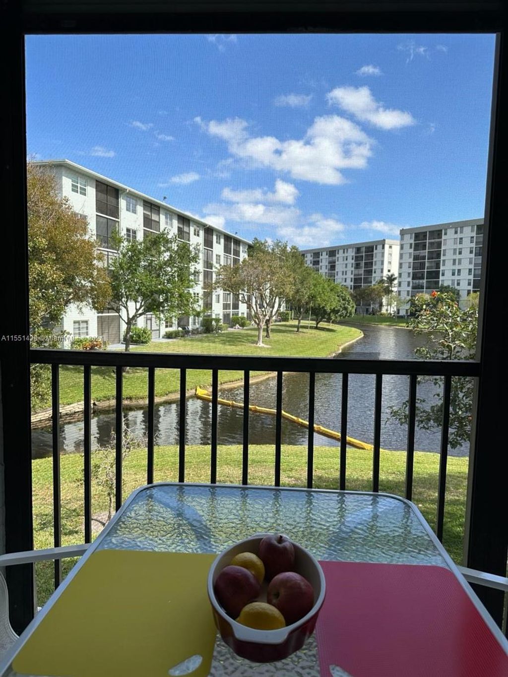 Photo of 2228 N Cypress Bend Dr #203, Pompano Beach, FL 33069 (MLS # A11551438)