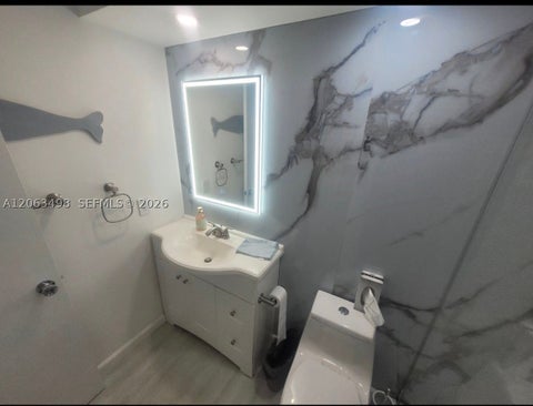 Photo of 300 Golden Isles Dr #217, Hallandale Beach, FL 33009 (MLS # A12063498)