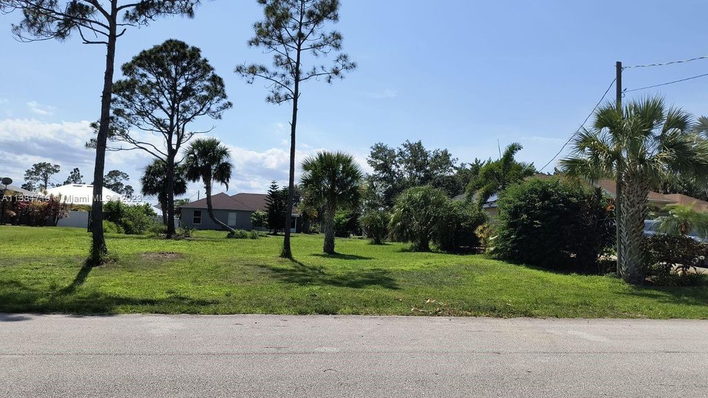 Photo of 1120 SW Khan Dr, Port Saint Lucie, FL 34953 (MLS # A11384719)