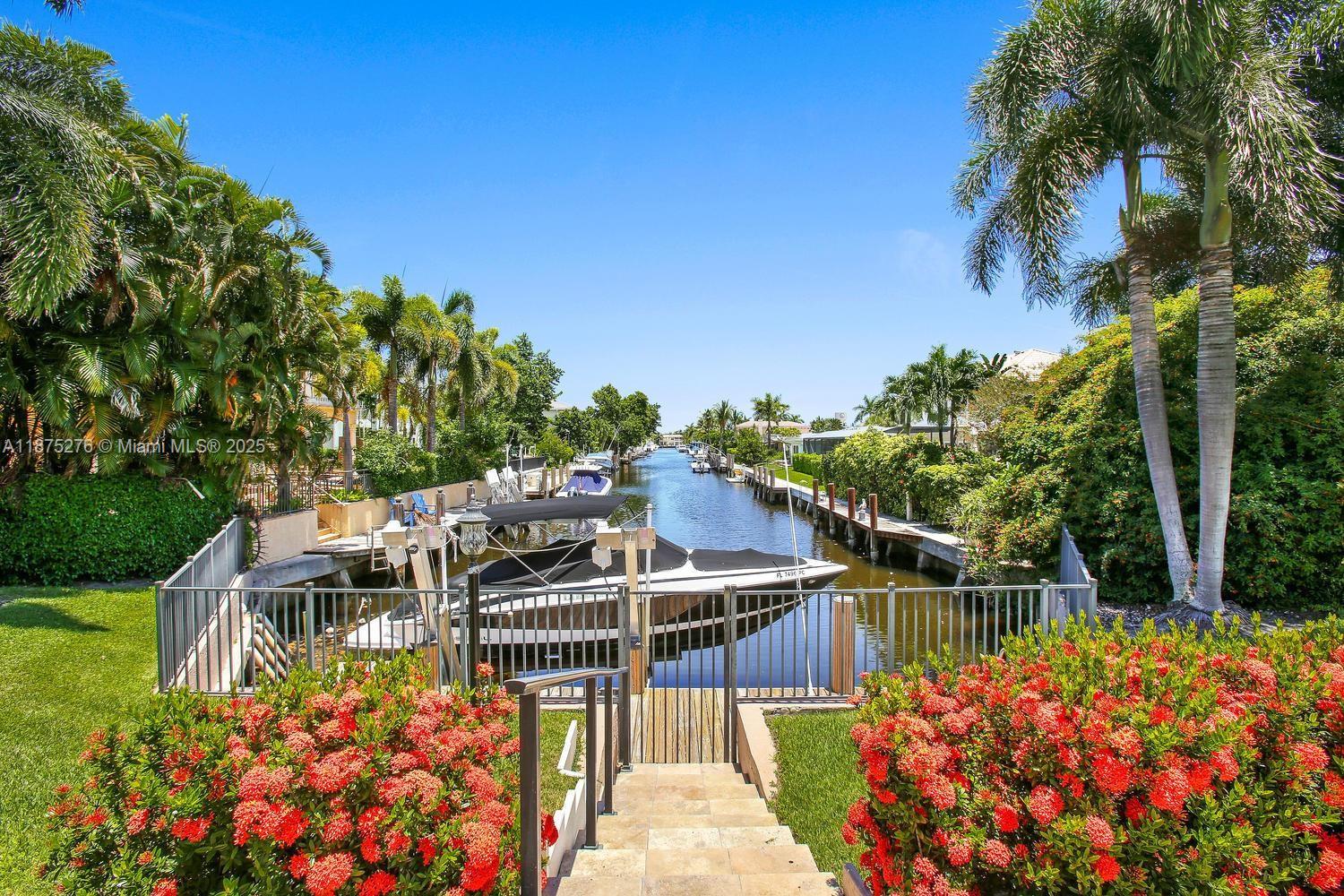 WATERFRONT 3/2 HOME IN ONE OF THE MOST SOUGHT AFTER AREAS OF EAST BOCA,"BOCA HARBOUR". THIS RANCH STYLE HOME IS LOCATED AT THE END OF THE WIDE CANAL W/ BEAUTIFUL UNOBSTRUCTED WATERVIEW. ELEVATED LOT APPROX 10,000sqft. W/ LUSHLY LANDSCAPED YARD SURROUNDING PRIVATE POOL. COMPLETE WITH IMPACT DOORS & WINDOWS. THE PRIMARY SUITE HAS PRIVATE ENTRANCE TO POOL AREA. , LARGE WALKIN CUSTOM CLOSETS. THIS WATERFRONT PROPERTY WITH PRIVATE DOCK. DIRECT ACCESS TO THE INTRACOASTAL & OCEAN. NO FIXED BRIDGES, IDEAL FOR BOATERS, ENJOY BREATHTAKING SUNSETS. THIS PROPERTY IS GREAT FOR ENTERTAINING AND HAS LIMITLESS POTENTIAL, "DESIGN THE HOME OF YOUR DREAMS"