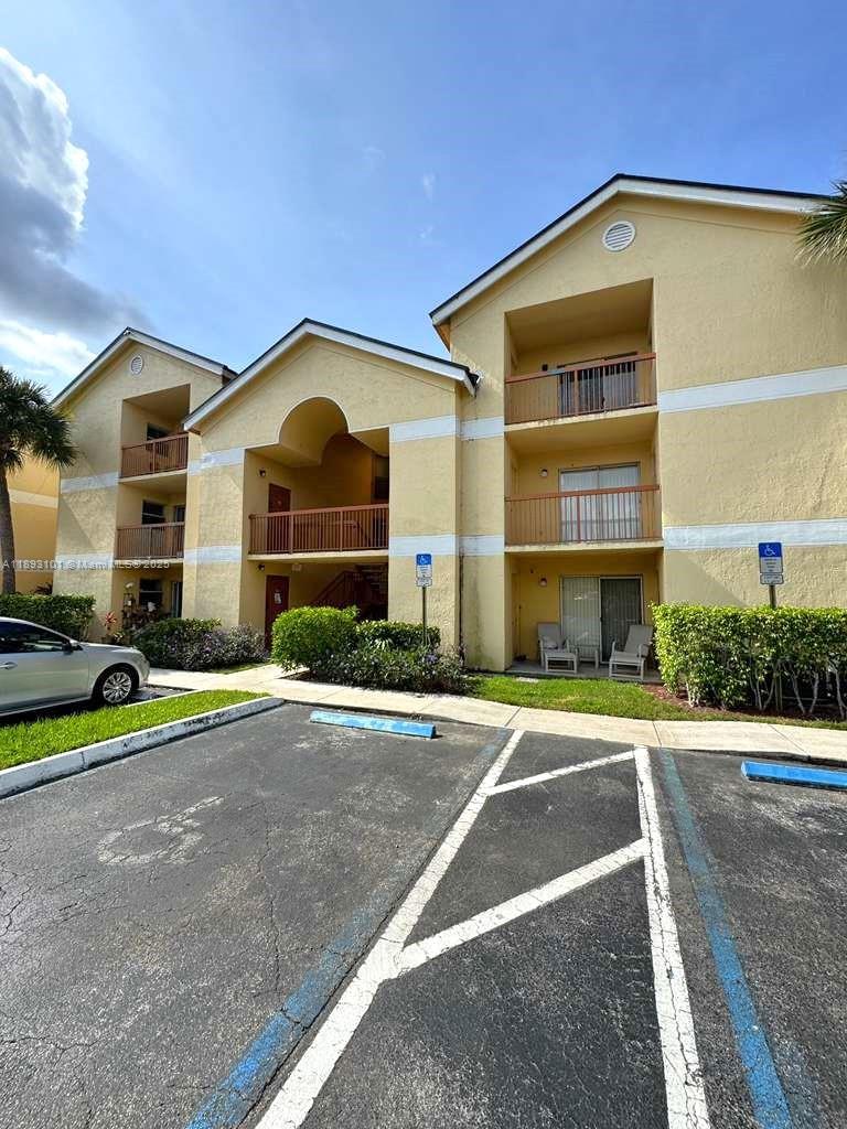 Beautifully maintained 2-bed, 2-bath condo in the desirable South Palm Place community. This bright split floor plan offers, natural light, laminate floors throughout the unit, and stainless steel appliances. Enjoy two private balconies, walk-in closets, and a full-size washer and dryer in the unit. The pet-friendly community features resort-style amenities including a pool, spa, gym, BBQ area, tennis courts, and walking paths. Recent upgrades include new metal roofs, concrete restoration, and exterior painting—all assessments paid. Conveniently located near parks, dining, highways, and Sawgrass Mills. Two parking spaces. All ages welcome, 700+ credit required, and rentals allowed—ideal for first-time buyers or investors! EASY TO SHOW!