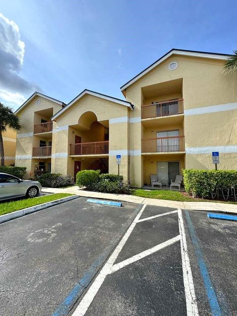 Photo of 7610 Westwood Dr #122, Tamarac, FL 33321 (MLS # A11893101)