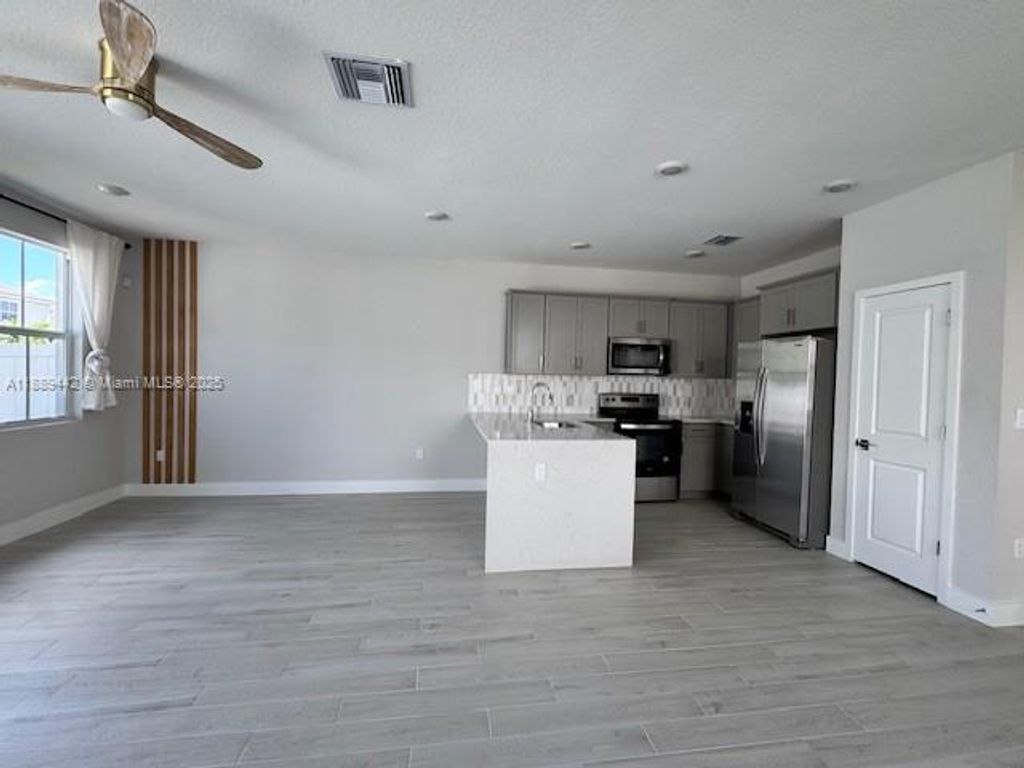 Photo of 151 SW 171st Ln #151, Pembroke Pines, FL 33027 (MLS # A11889442)