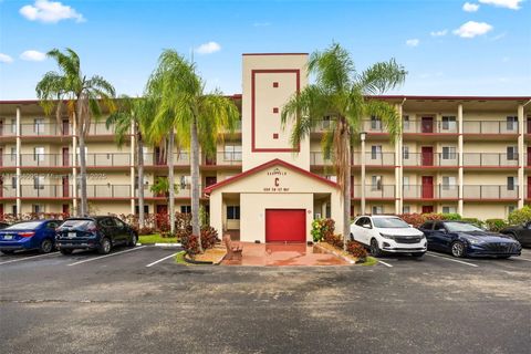 Photo of 1600 SW 127th Way #302C, Pembroke Pines, FL 33027 (MLS # A11904099)