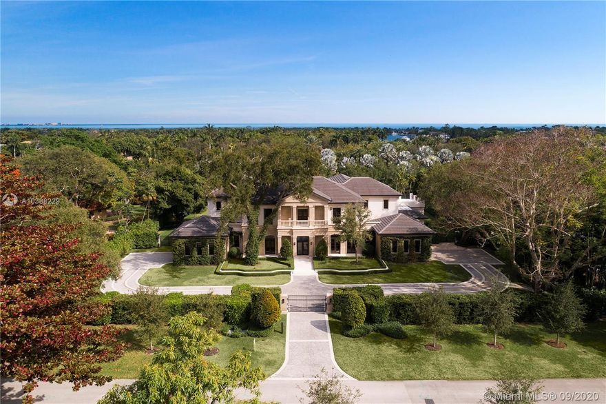 Set perfectly on a 50,000sf waterfront lot in prestigious and gated Gables Estates, this 2017 classic Palladian home offers the perfect backdrop for either lavish entertaining or cozy family affairs.In the 12,839 sf home, one finds a theater, large family room,gourmet cook’s, eat-in kitchen, and master suite with his and her lavish baths and dressing room closets; 4 car garage, covered terraces with a cabana, summer kitchen and sparkling, oversized pool, serve as the centerpiece of the rolling back lawn.