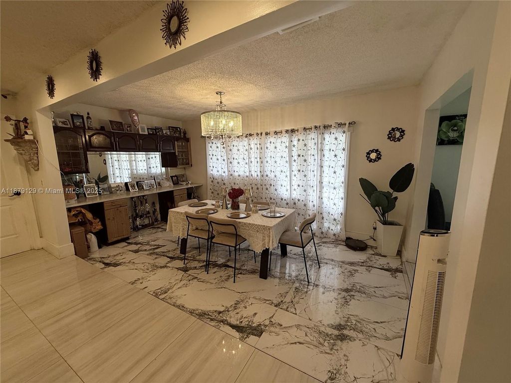 Photo of 4071 NW 115th Ave, Coral Springs, FL 33065 (MLS # A11879129)