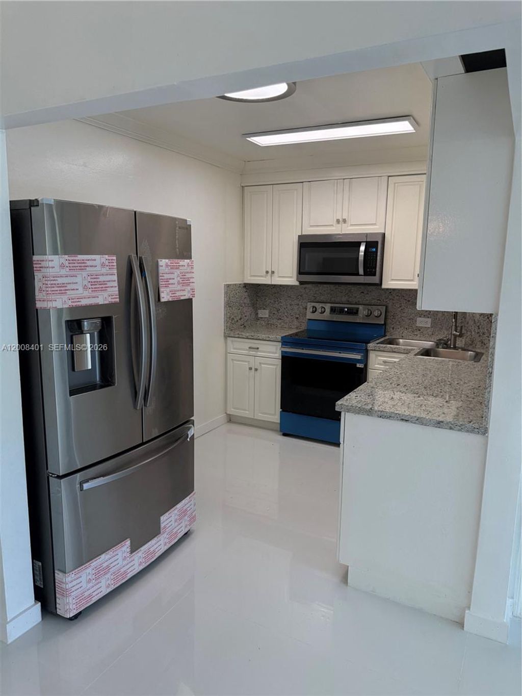 Photo of 1625 SE 10th Ave #101, Fort Lauderdale, FL 33316 (MLS # A12008401)
