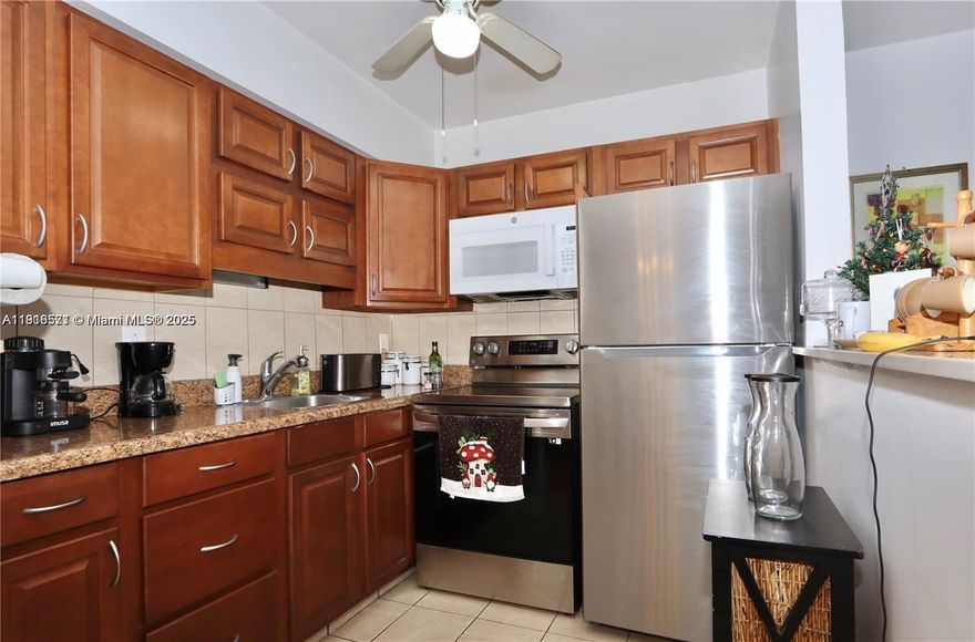 **Nicely updated 1 bedroom unit convenently located just steps from the pool and clubhouse area.** Enjoy this well located, remodeled unit near everything and low maintenance fees.** Priced right for fast sale.**