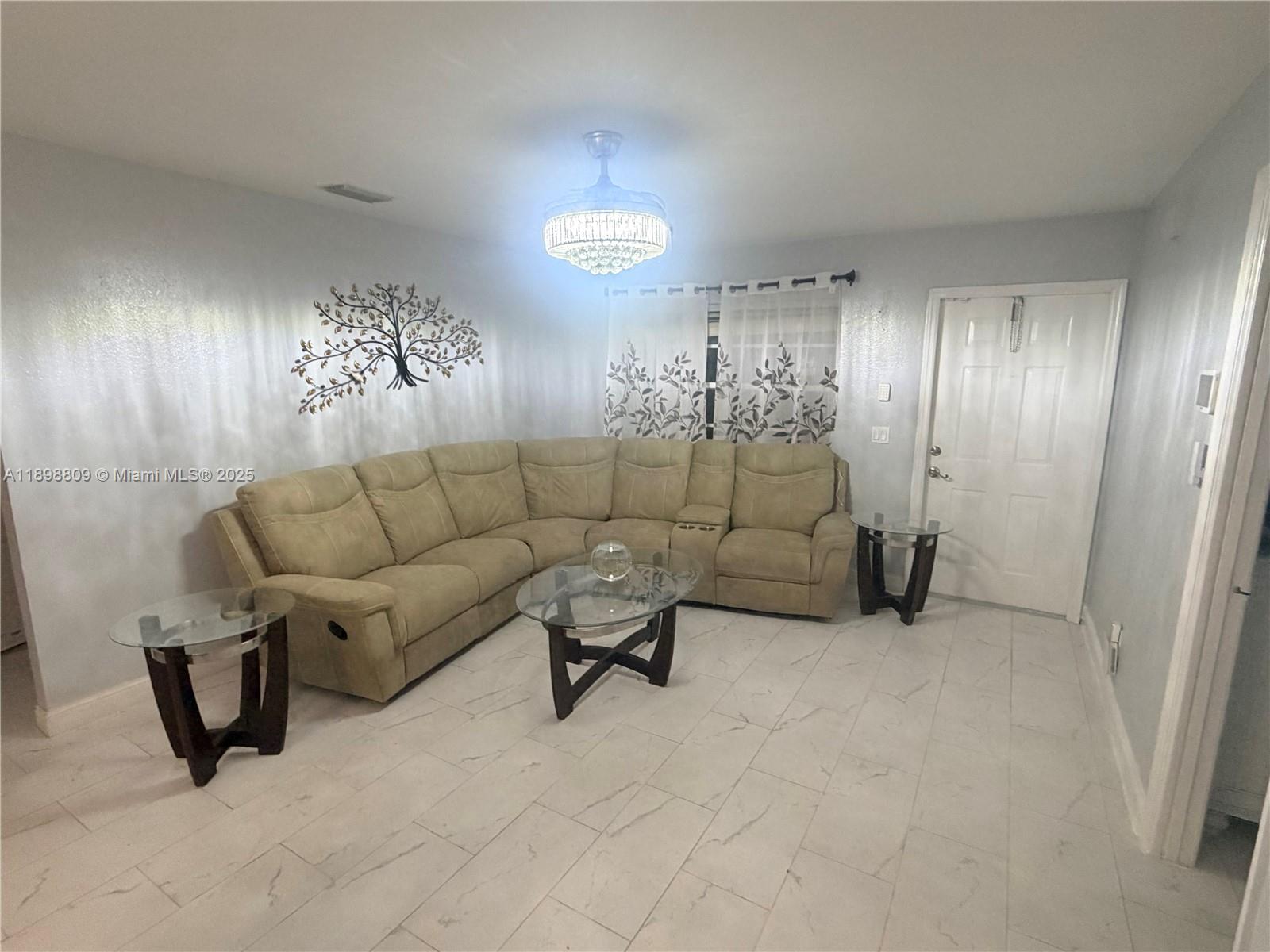 Beautiful residential home in Port Saint Lucie! This charming property has a lot to offer - No HOA, Solar Panels installed in 2023, water treatment 2022, master bathroom upgrade 2023, new tile Floor Throughout 2023, new Kitchen 2023, interior painted 2023. A lush backyard with Almost 0.5 acres and a Gazebo perfect for outdoor living and toy storage (boat, RV, ATV). Located in a quiet, family-friendly neighborhood with easy access to parks, schools, and shopping. Ideal for families looking for comfort and convenience growing community. A must-see opportunity!