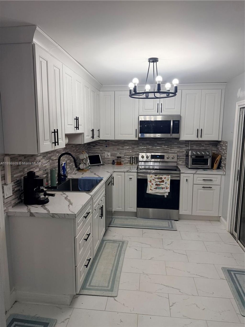 Photo of 1645 SE North Blackwell Dr, Port St Lucie, FL 34952 (MLS # A11898809)