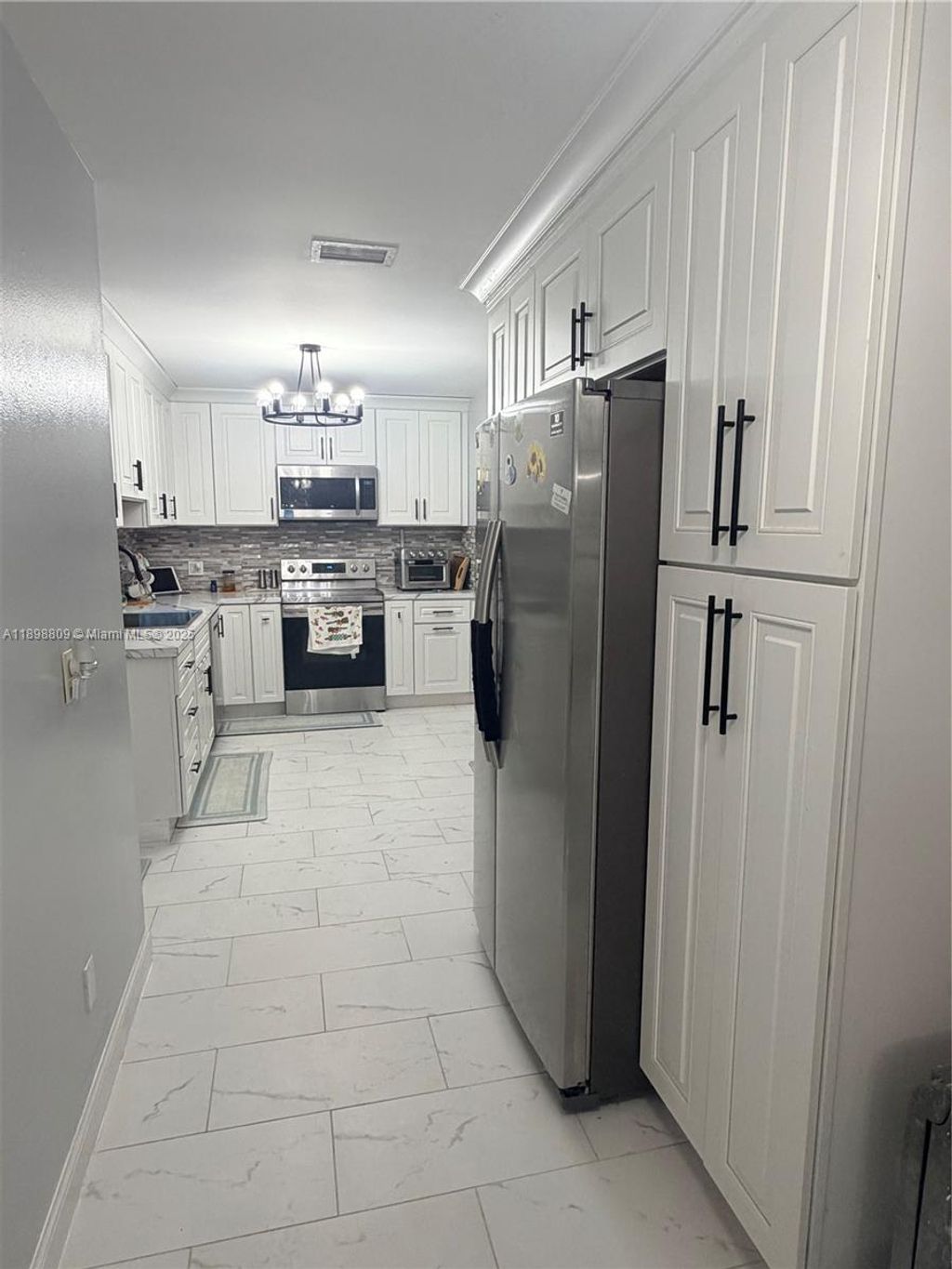 Photo of 1645 SE North Blackwell Dr, Port St Lucie, FL 34952 (MLS # A11898809)