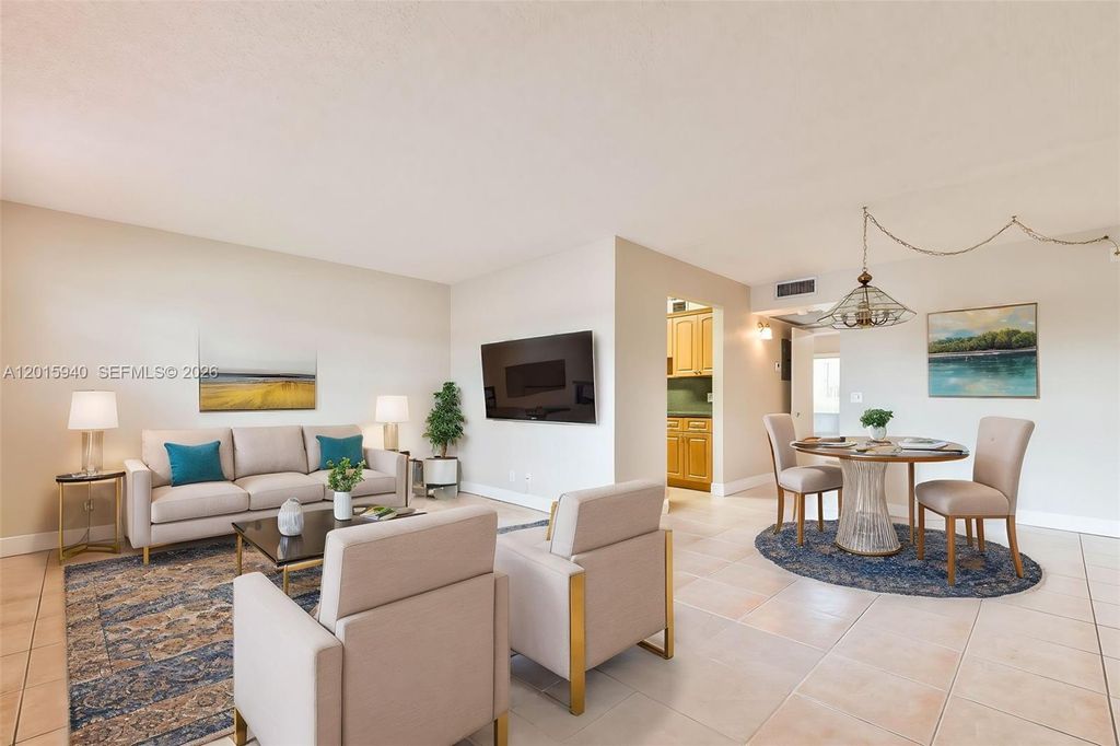 Photo of 13355 SW 9th Ct #104H, Pembroke Pines, FL 33027 (MLS # A12015940)