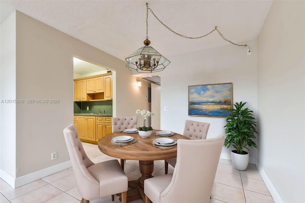 Photo of 13355 SW 9th Ct #104H, Pembroke Pines, FL 33027 (MLS # A12015940)