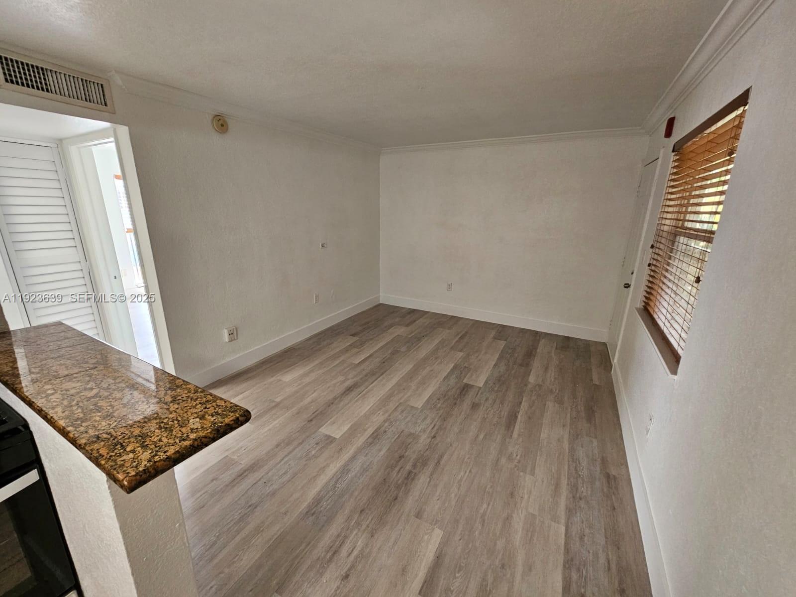 241 S Royal Poinciana Blvd 202