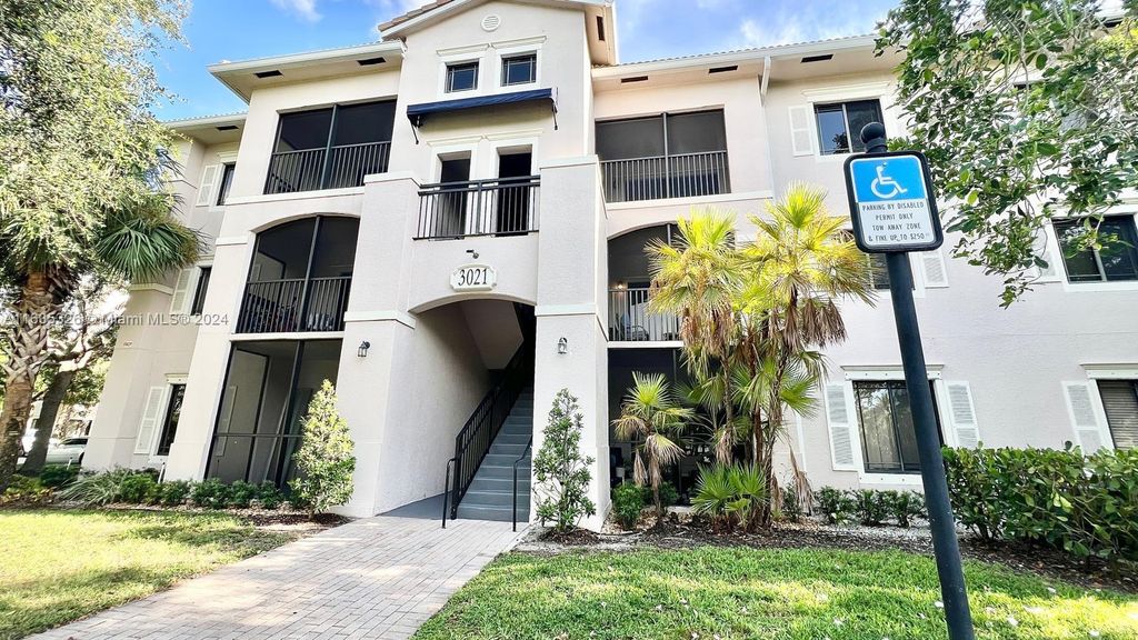 Photo of 3021 Alcazar Pl #101, Palm Beach Gardens, FL 33410 (MLS # A11635326)