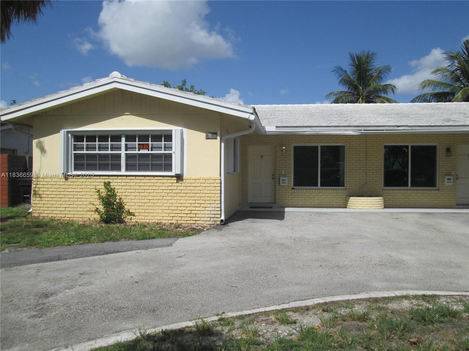 Spacious and upgraded including hurricane impact windows throughout, kitchen and baths updated in the past 5 years, tiled throughout and freshly painted. Large open kitchen with family room or dining area, utility room with washer and dryer and extra storage space. Bedrooms are generous sized with walk in closets and fans in every room. Back yard for relaxing or entertaining. Short walk to Lauderdale by the Sea beach and pier and restaurants, bakeries, etc. Only 2 blocks from Cardinal Gibbons and children's park with new eliptical equipment. Easy to show, come check it out, perfect location.