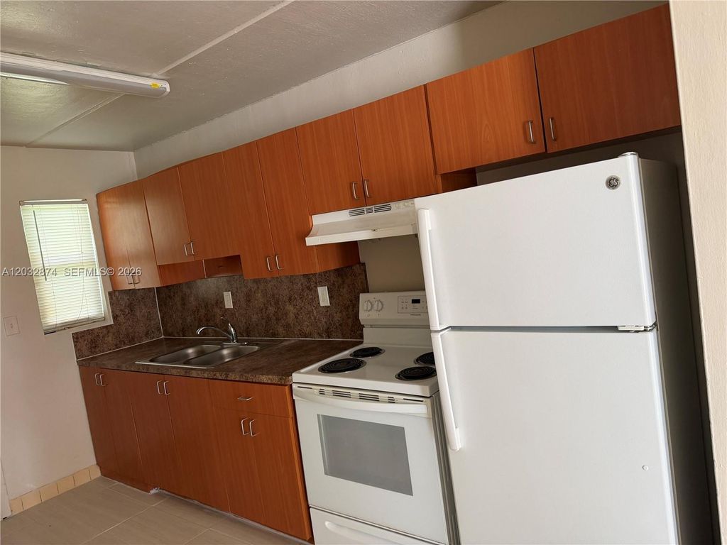 Photo of 307 NW 12th Ave #2, Fort Lauderdale, FL 33311 (MLS # A12032874)