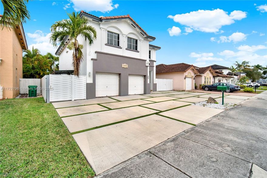 Opportunity knocks in this great location in West Kendall.  This large home offers plenty of living space, 4 bedrooms and 3 full baths in main house and a 1 bedroom 1 bath converted garage perfect for in-laws or older kids seeking a bit of independence.  The back yard leaves nothing to be desired, pool with large retractible awning that gives you amazing shade, outdoor kitchen to host parties and enjoy with friends and family.   Close to highway entrances, KROME Avenue, hospitals and shopping all within short drives.  Elementary school is on excellent school list, middle and high school both offer magnet programs.