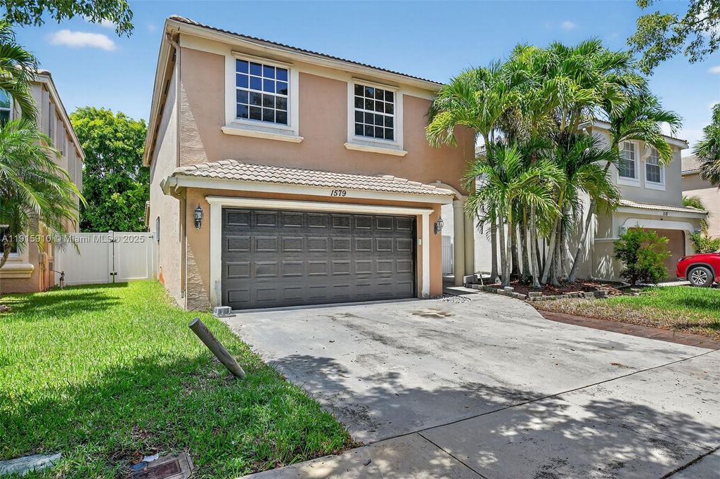 Photo of 1579 Briar Oak Dr, Royal Palm Beach, FL 33411 (MLS # A11915910)